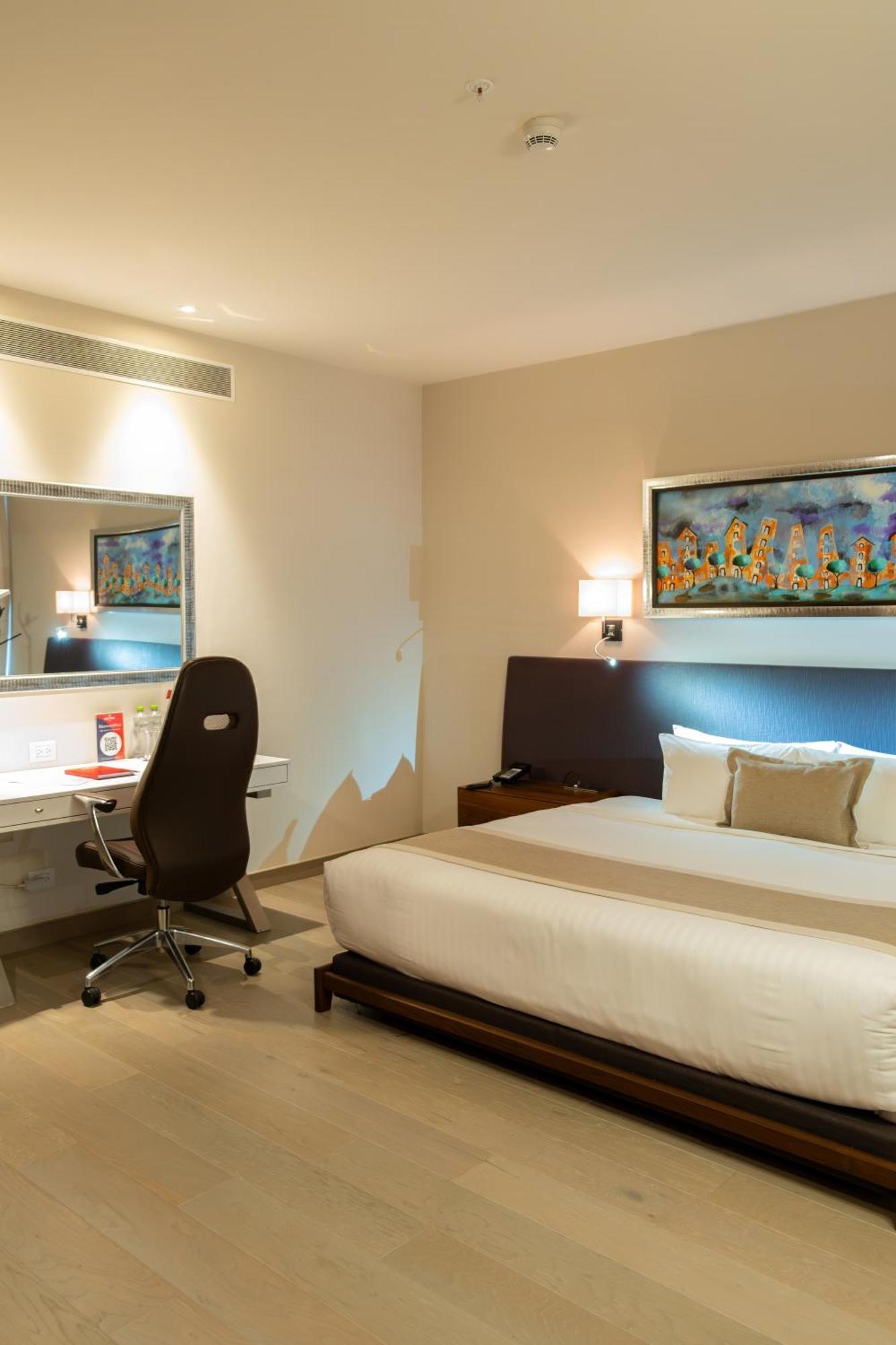 Metria Hotel Leon Ngoại thất bức ảnh A room at the hotel